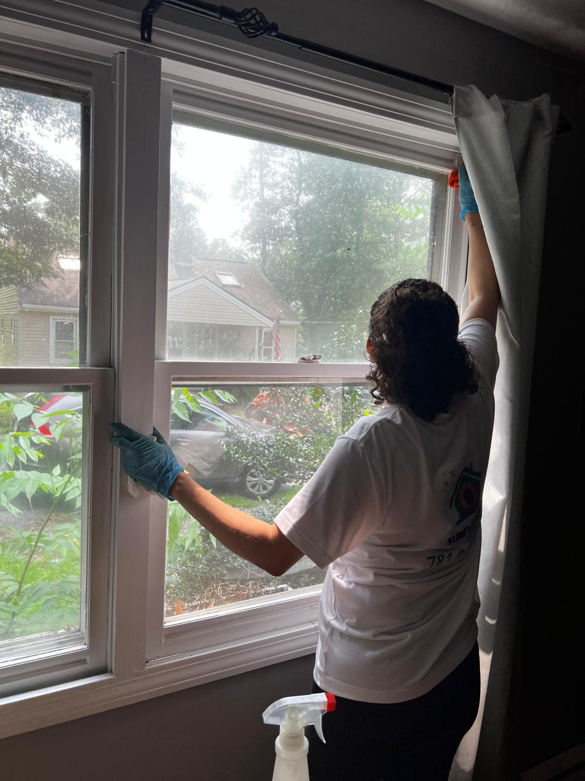 A Sunflowers Cleaning Service team member at work